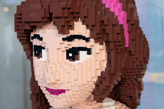 Bangkok, Thailand &ndash; December 31, 2023: Close-up of a life-size LEGO brick-built sculpture depicting a female character, on display at a LEGO store.
