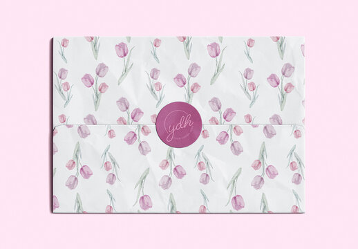 Tissue Paper Wrap Mockup with Retail Sticker Closure