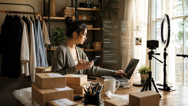 Female E-commerce Entrepreneur Working on Laptop with Futuristic HUD Overlay Smart Dashboard for Online Sales and Order Tracking