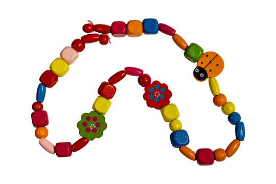 Colorful geometric wooden beads necklace with playful ladybug accent