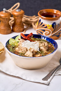 Mexican menudo stew in traditional bowl