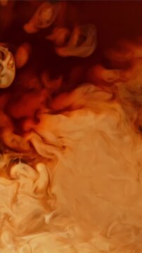 Milk is mixed with black coffee. Filmed on a high-speed camera at 1000 fps. High quality FullHD footage