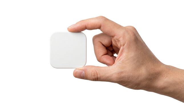 Minimalist white square smart sensor held in hand, compact electronic tracking device, wireless smart home automation hardware for security isolated PNG with Transparent Background