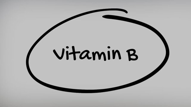 Vitamin B Hand Writing Text on Glass Screen