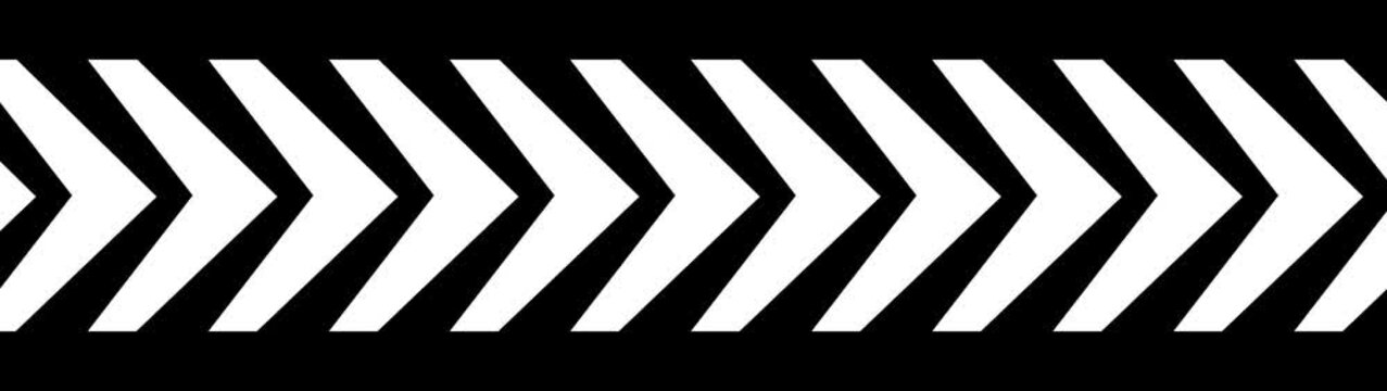 A seamless repeating pattern of chevron arrows pointing to the right in alternating black and white stripes creating a bold border or background with a sense of forward motion and directionality