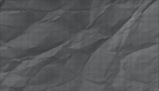 A crumpled gray paper texture fills the entire frame of the close-up view