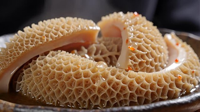 Closeup of cooked tripe in a bowl a delicacy in many cuisines.