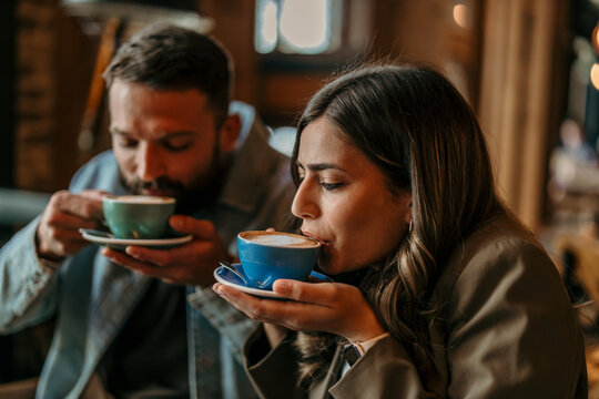 Couple enjoying coffee together on a relaxed date