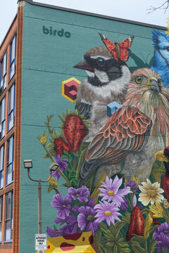 mural by birdO (Jerry Rugg) on the east facing brick wall of 520 Kingston Rd, Toronto