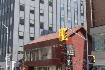 Fototapeta premium wide view of Loro Piana, a clothing store, located here at 111 Bloor St W, Toronto