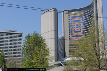 Naklejka premium east tower with World Cup branding at City Hall - looking north from Queen St W, Toronto