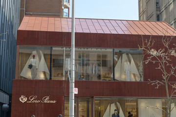 Naklejka premium exterior building facade and sign of Loro Piana, a luxury clothing store, located at 111 Bloor St W, Toronto