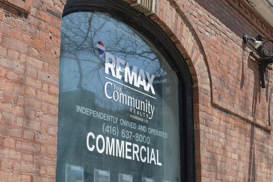 window with sign of Toronto office of RE/MAX Your Community Realty, 187 King St E (Little York Hotel, 1879-1880, designed by Langley & Burke)