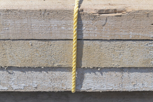 poly rope and hard wood planks at a construction site