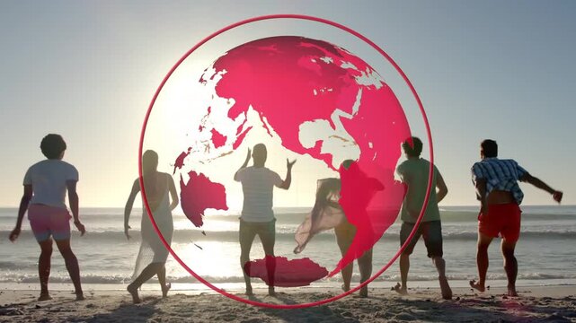 Group running to shore then jumping, sunset sparking play, red globe framing shadows for marketing
