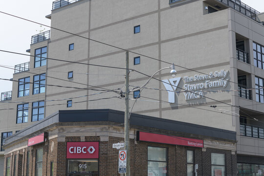 exterior of CIBC bank branch (915 Kingston Rd) and The Steve & Sally Stavro Family YMCA, located at 907 Kingston Rd, Toronto