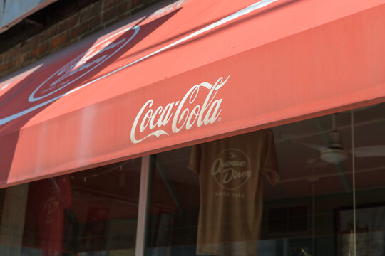 Coca-Cola sponsored awning protection outside Avenue Diner, a restaurant, located at 222 Davenport Rd, Toronto