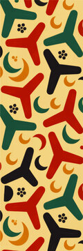 Seamless abstract boomerang pattern with colorful geometric shapes and playful retro design on warm yellow background
