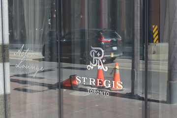 Naklejka premium vinyl window sign at The St. Regis, a five star hotel, located at 325 Bay St, Toronto