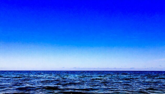Clear Blue Sky Meets Blue Sea Horizon