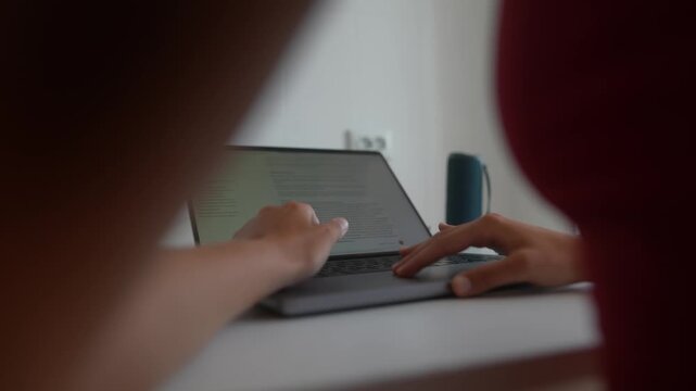 Individual engaged in digital tasks within peaceful workspace environment