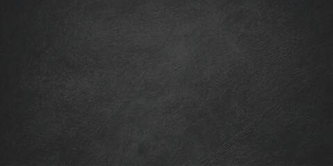 Dark gray chalk board background with subtle texture vignetted edges and a clean matte finish for design layouts. dark gray chalkboard or concrete texture background © Creative Lis