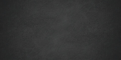 Dark gray chalk board background with subtle texture vignetted edges and a clean matte finish for design layouts. dark gray chalkboard or concrete texture background © Creative Lis