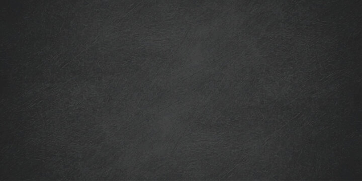 Dark gray chalk board background with subtle texture vignetted edges and a clean matte finish for design layouts. dark gray chalkboard or concrete texture background