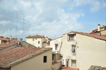 Obraz premium Terracotta Rooftops and Historic Buildings in Florence Italy