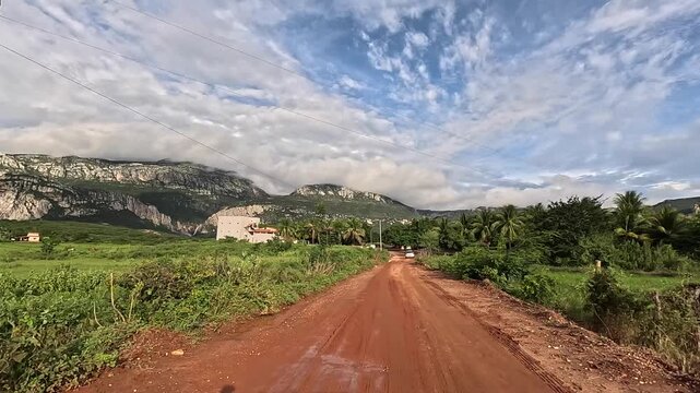 Driver's viewpoint on the dirt road of Serrado Park in Porteirinha, Minas Gerais, Brazil