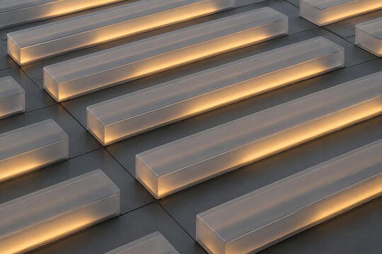Minimalist Product View of Frosted Glass Logic Rails Arranged in Parallel Rows with Internal Soft Amber Status Glow.