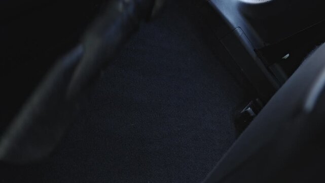 Professional cleaner restoring vehicle cleanliness effectively