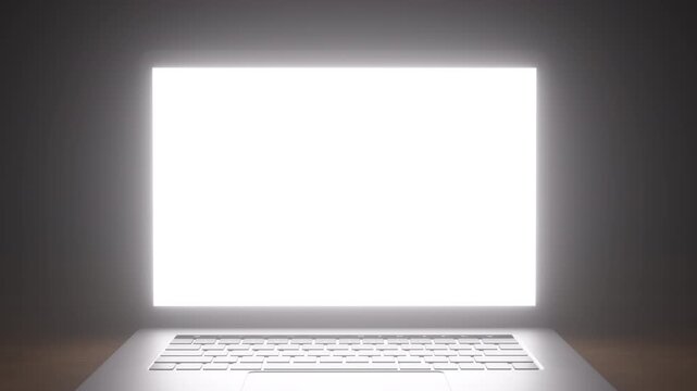 Open laptop with glowing white screen and silver keyboard on gradient background in close-up shot