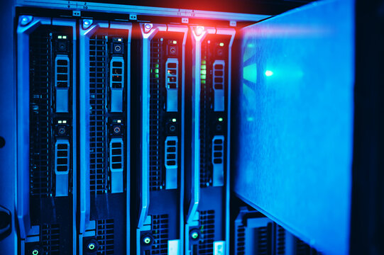 Futuristic glowing server front panel Abstract technology background representing cybersecurity web hosting and network infrastructure.