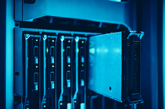 Futuristic glowing server front panel Abstract technology background representing cybersecurity web hosting and network infrastructure.