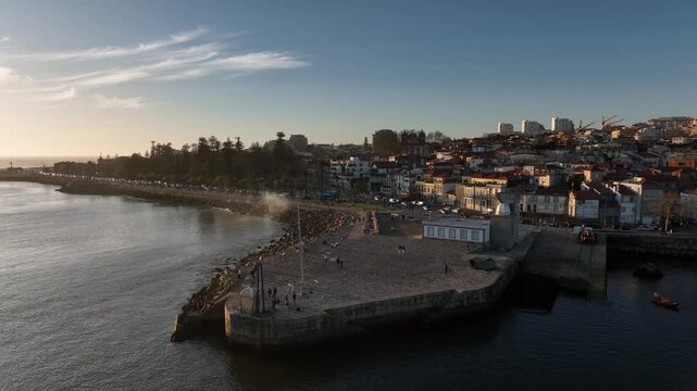 Drone Footage of Foz do Douro Waterfront in Porto Portugal During a Golden Sunset