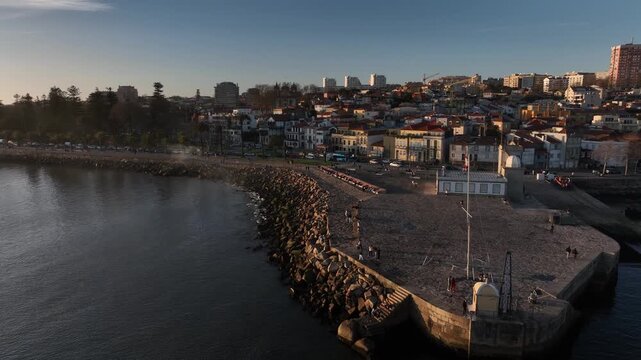 Drone Footage of Foz do Douro Waterfront in Porto Portugal During a Golden Sunset