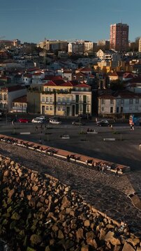Drone Footage of Foz do Douro Waterfront in Porto Portugal During a Golden Sunset