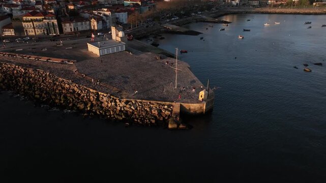 Drone Footage of Foz do Douro Waterfront in Porto Portugal During a Golden Sunset