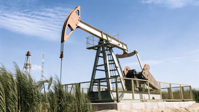 Oil Pump, Fossil Fuel Energy, Old Pumping Unit. Platform. Extraction of pumping station. Industrial oil pump jack working and pumping crude oil for fossil fuel energy with drilling rig in oil field.
