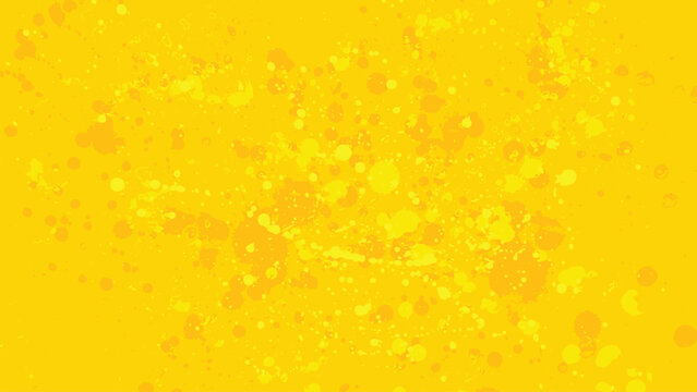 A messy yellow background with yellow paint drops of varying shades.