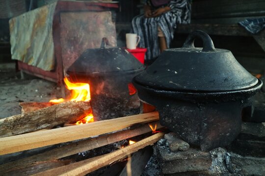 A traditional serabi mold and a clay stove (anglo) heated by firewood. This clay cookware is very popular in various regions of Indonesia.