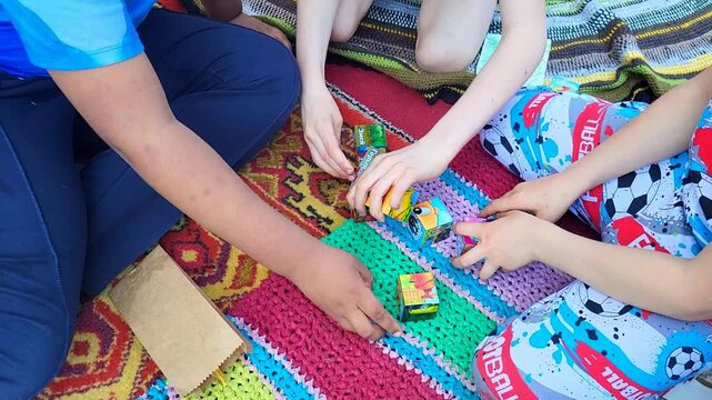 Children participating in a group social science project, sociology research on teamwork, community education. collaborative learning, social development, pedagogy study.