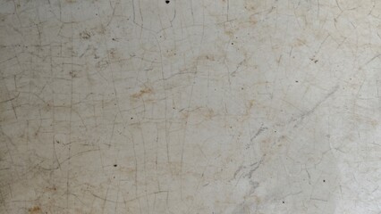 Fototapeta premium Light textured wall surface with subtle stains and aged appearance creating minimal abstract background suitable for interior and construction themes.