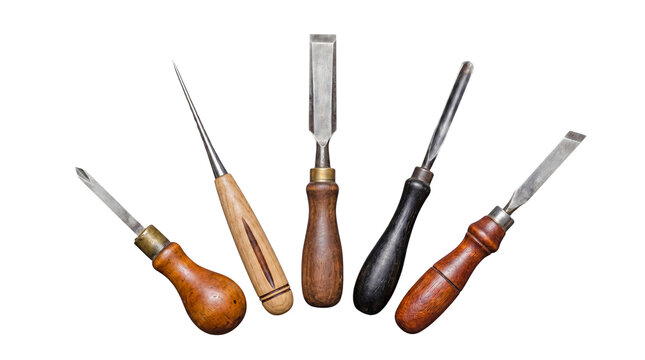 Five traditional wood carving chisels with wooden handles, arranged creatively on transparent background.