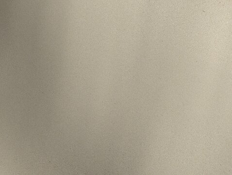 Minimalist close-up of clean white sea sand featuring a smooth natural texture, ideal for beach-themed designs, summer concepts, backgrounds, and copy space.