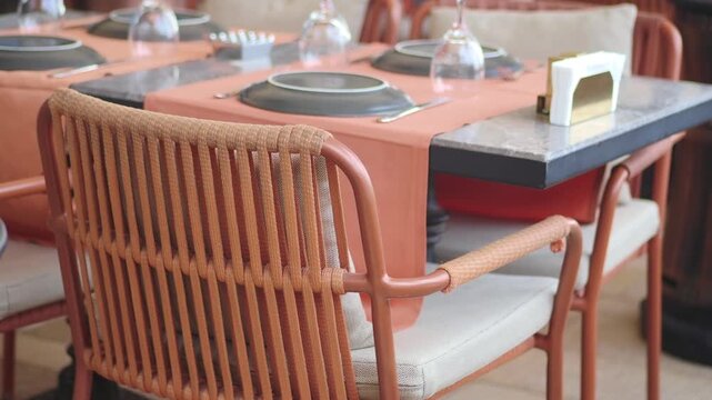 Dining table setup at a restaurant during the day