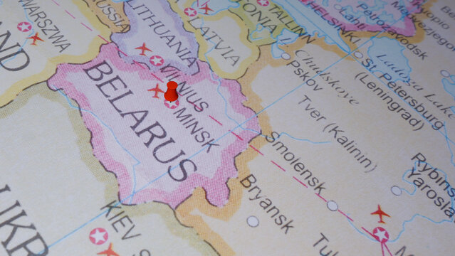 Map of Belarus with a red pin on Minsk. Travel concept showing the European country's capital.