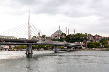 Obraz premium The Metro Bridge that connects two sides of the Golden Horn in Istanbu