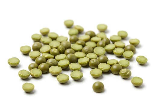 Close up of green split peas scattered on white surface isolated view